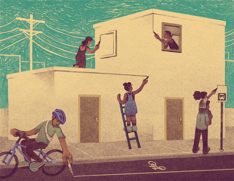 A group of people drawing their own buildings, street signs, and bike lanes to make them a reality.